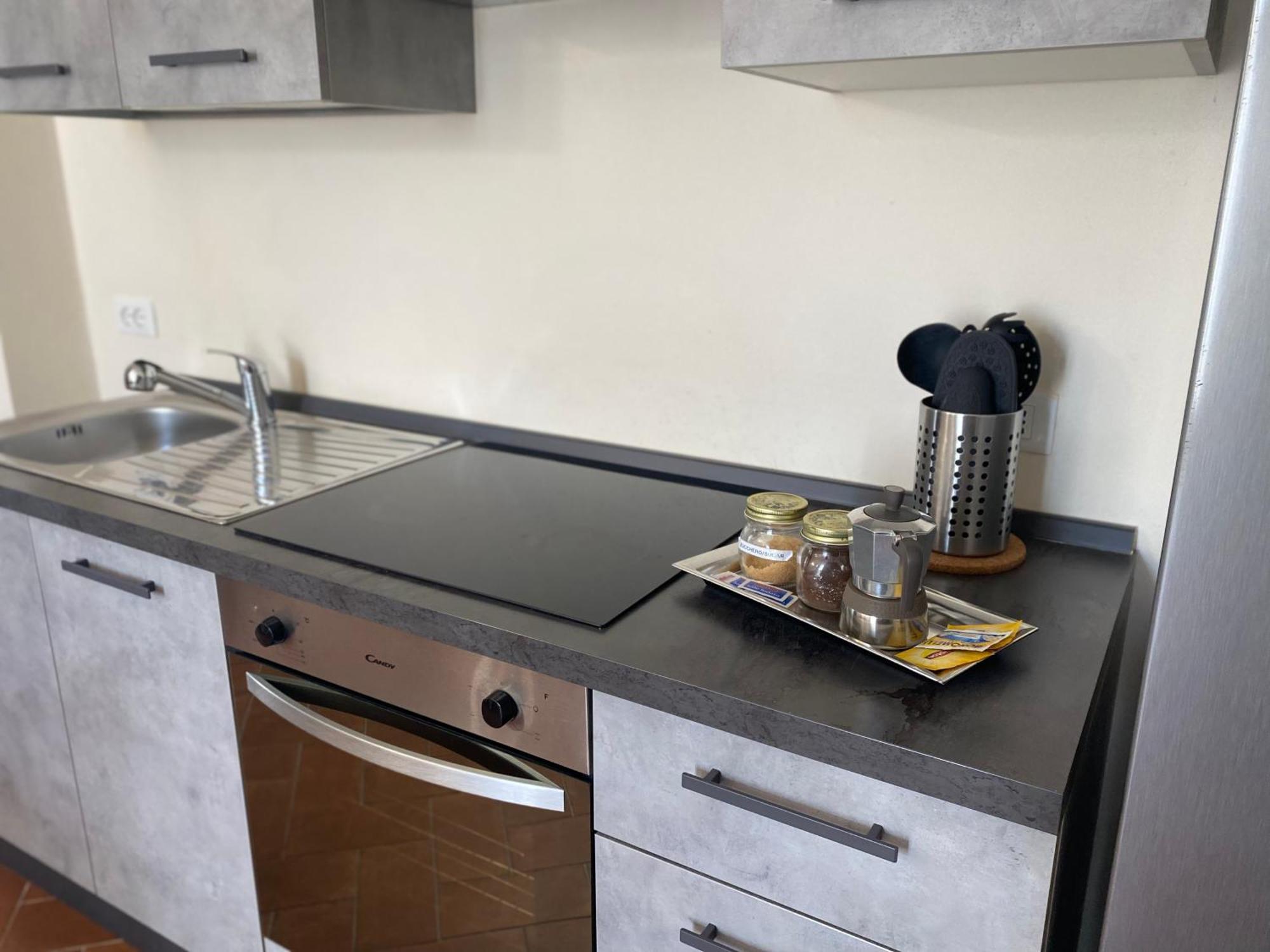 Appartement Residenza Cipressi E Olivi à Vérone Extérieur photo